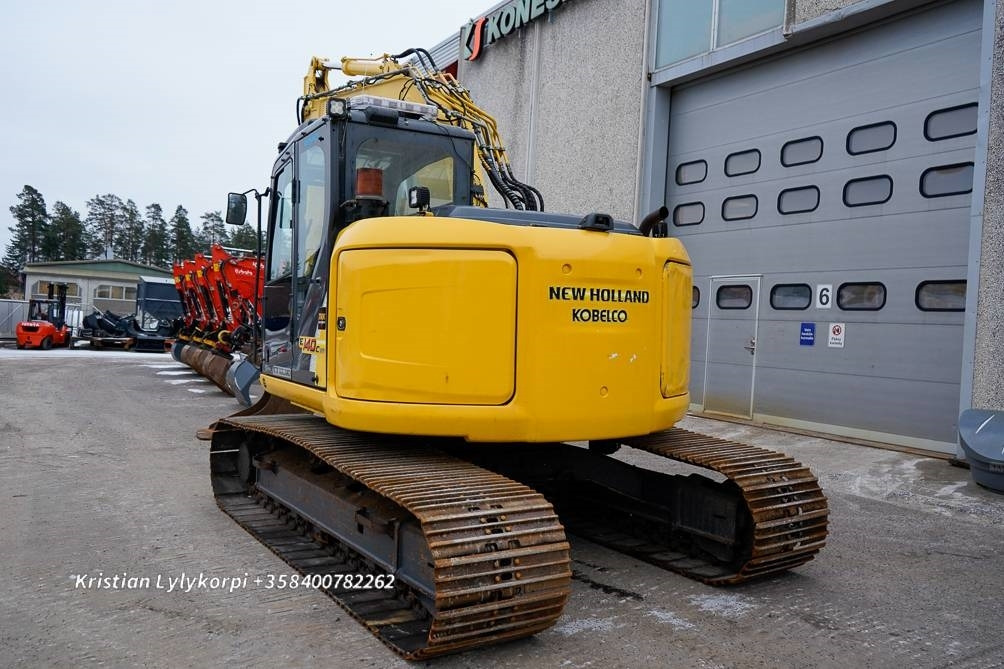 New Holland E140CSR PYÖRITTÄJÄLLÄ - Ekskavator me zinxhirë: foto 3 New Holland E140CSR PYÖRITTÄJÄLLÄ - Ekskavator me zinxhirë: foto 3