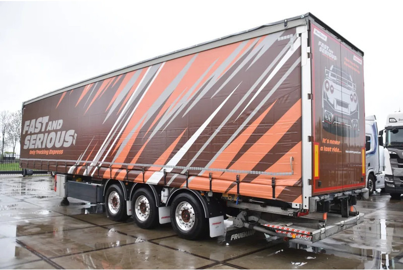 Fruehauf SLIDING CURTAINS/ROOF - TOPLIFT SYSTEM - LIFT AXLE - STEERING AXLE - SAF AXLES - ALCOA'S - DHOLLANDIA - TOP CONDITION - - Gjysmë rimorkio me tendë: foto 4 Fruehauf SLIDING CURTAINS/ROOF - TOPLIFT SYSTEM - LIFT AXLE - STEERING AXLE - SAF AXLES - ALCOA'S - DHOLLANDIA - TOP CONDITION - - Gjysmë rimorkio me tendë: foto 4