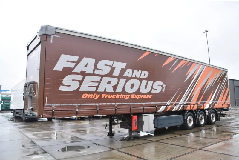 Fruehauf SLIDING CURTAINS/ROOF - TOPLIFT SYSTEM - LIFT AXLE - STEERING AXLE - SAF AXLES - ALCOA'S - DHOLLANDIA - TOP CONDITION - - Gjysmë rimorkio me tendë: foto 5 Fruehauf SLIDING CURTAINS/ROOF - TOPLIFT SYSTEM - LIFT AXLE - STEERING AXLE - SAF AXLES - ALCOA'S - DHOLLANDIA - TOP CONDITION - - Gjysmë rimorkio me tendë: foto 5