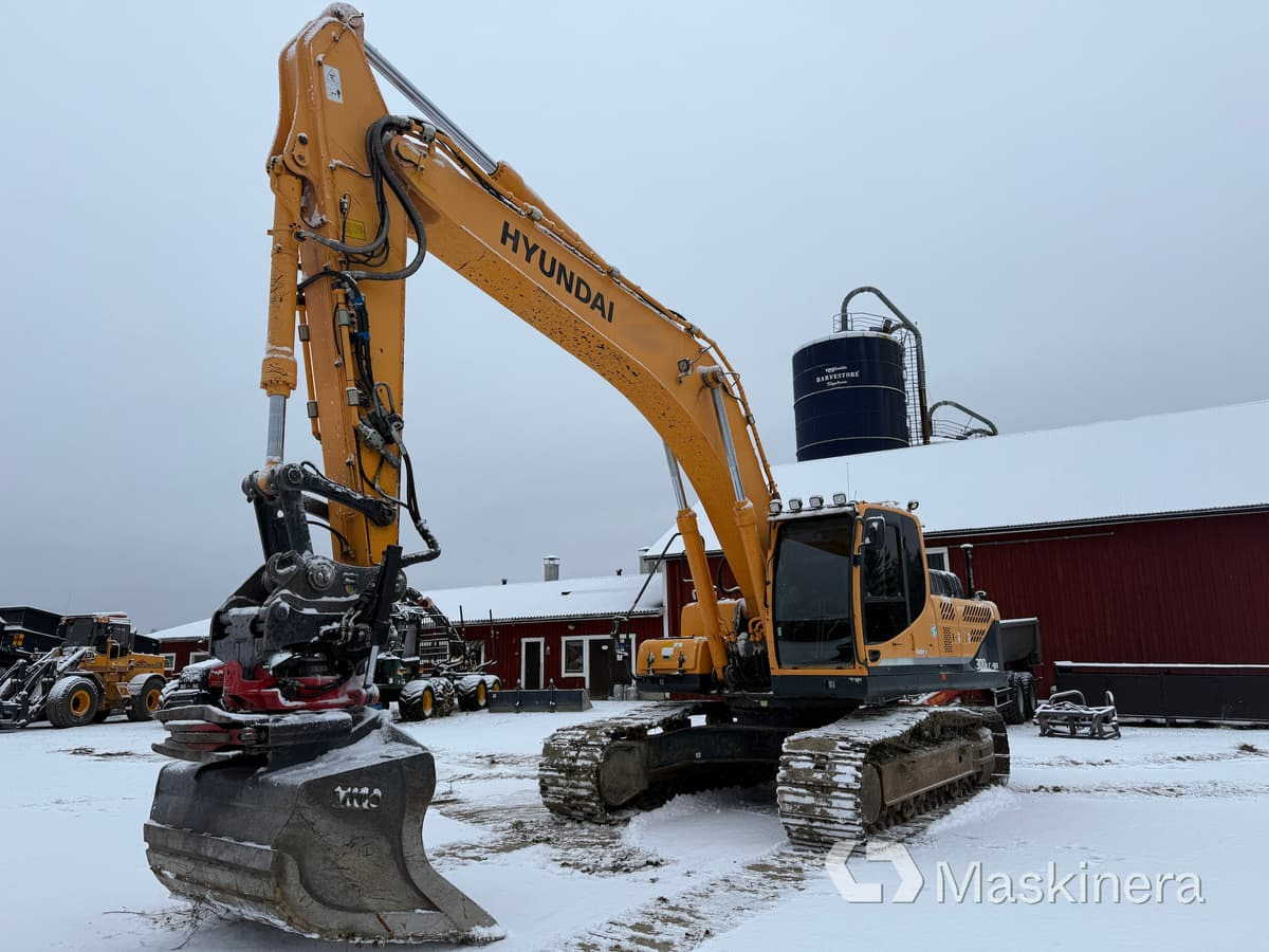 Grävmaskin Hyundai Robex 300LC-9A - Ekskavator me zinxhirë: foto 1 Grävmaskin Hyundai Robex 300LC-9A - Ekskavator me zinxhirë: foto 1