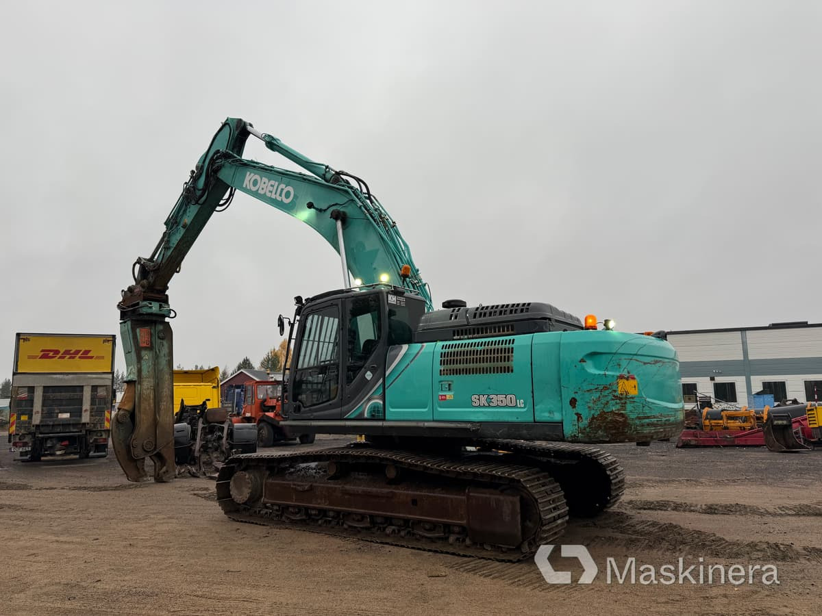Grävmaskin Kobelco SK350LC-10 med stålsax - Ekskavator me zinxhirë: foto 3 Grävmaskin Kobelco SK350LC-10 med stålsax - Ekskavator me zinxhirë: foto 3