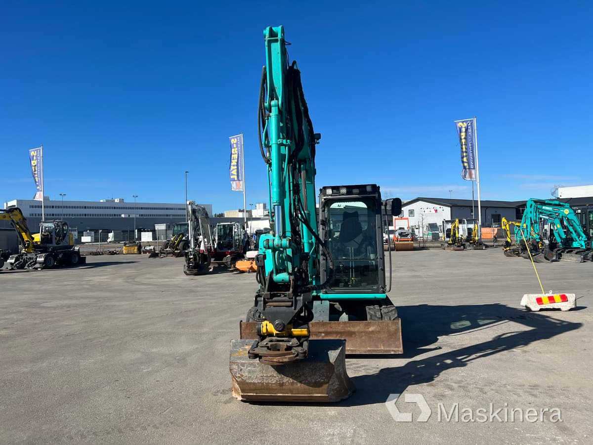 Grävmaskin Kobelco SK75SR-3E - Ekskavator me zinxhirë: foto 2 Grävmaskin Kobelco SK75SR-3E - Ekskavator me zinxhirë: foto 2