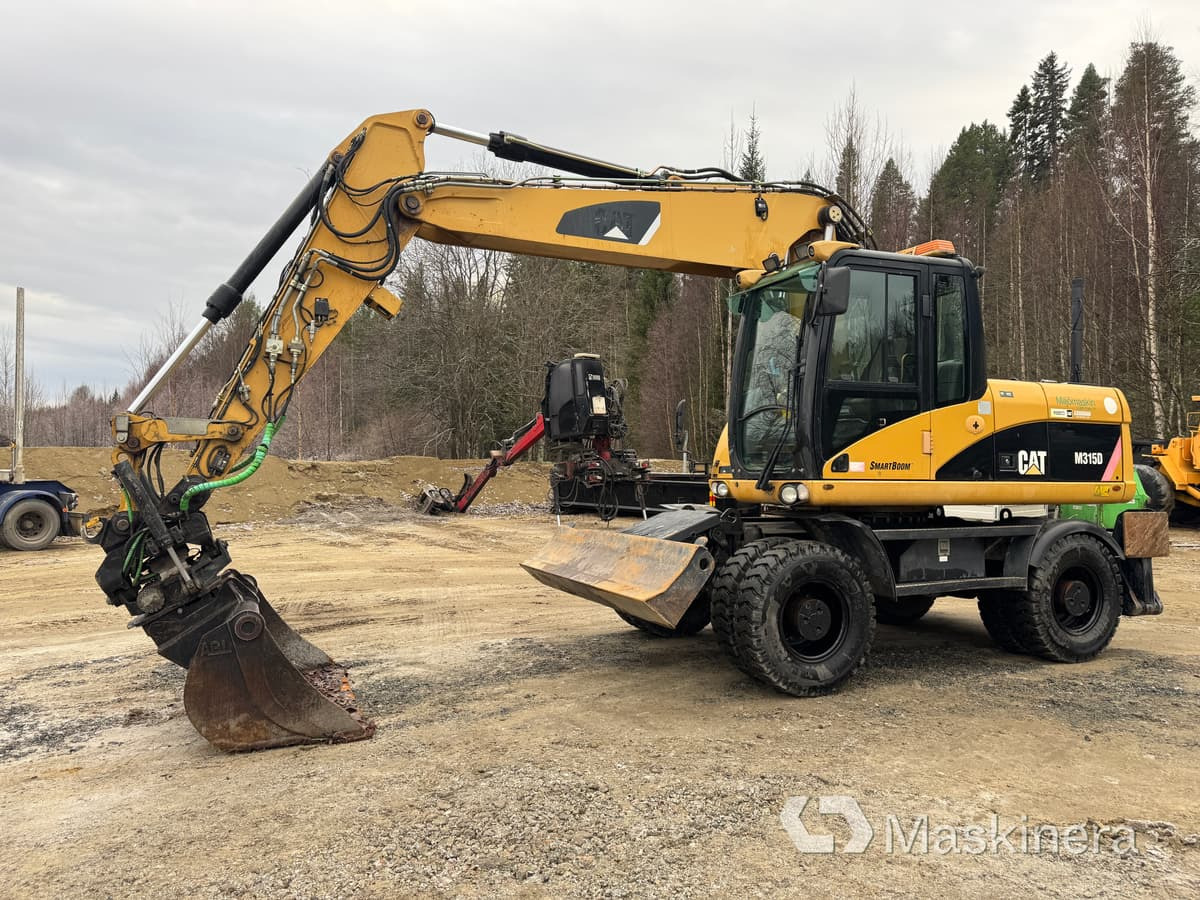 Hjulgrävare Cat M315D - Ekskavator me zinxhirë: foto 1 Hjulgrävare Cat M315D - Ekskavator me zinxhirë: foto 1