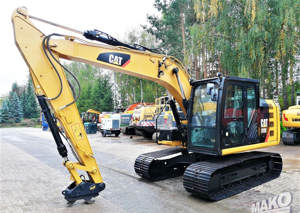 Caterpillar 312E - Ekskavator me zinxhirë: foto 1 Caterpillar 312E - Ekskavator me zinxhirë: foto 1