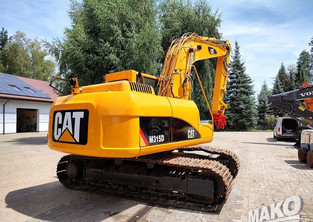 Caterpillar 315D - Ekskavator me zinxhirë: foto 5 Caterpillar 315D - Ekskavator me zinxhirë: foto 5