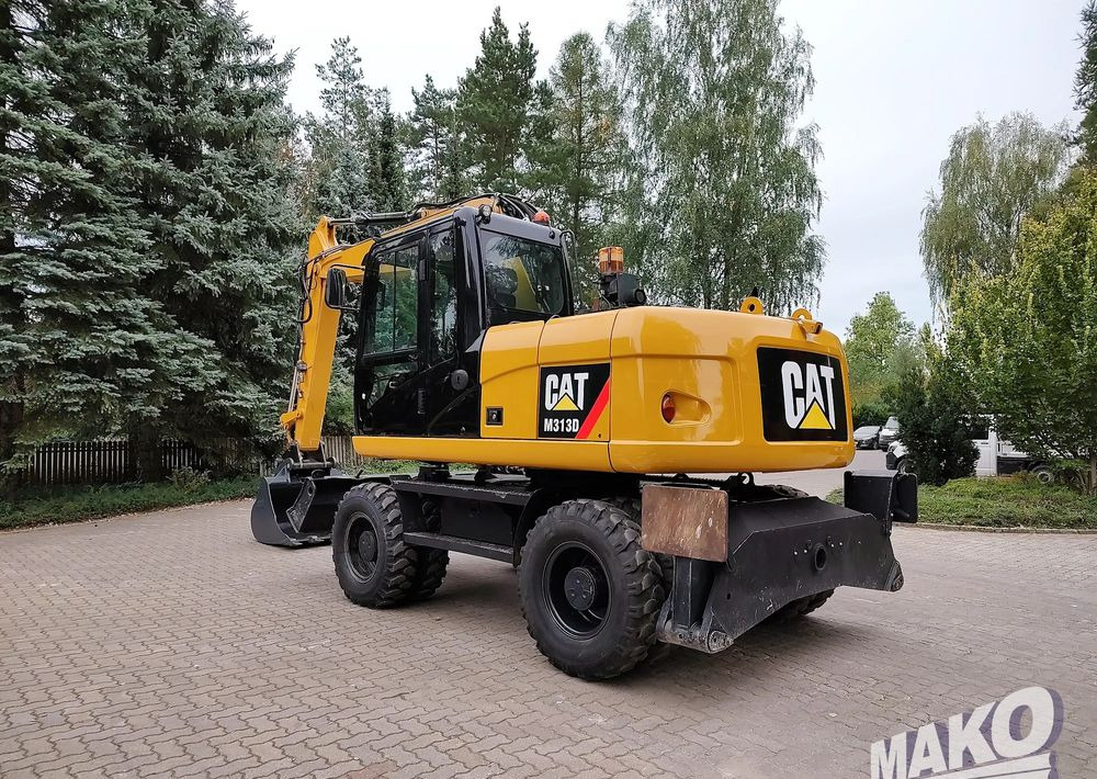 Caterpillar M313D - Ekskavator me goma: foto 2 Caterpillar M313D - Ekskavator me goma: foto 2