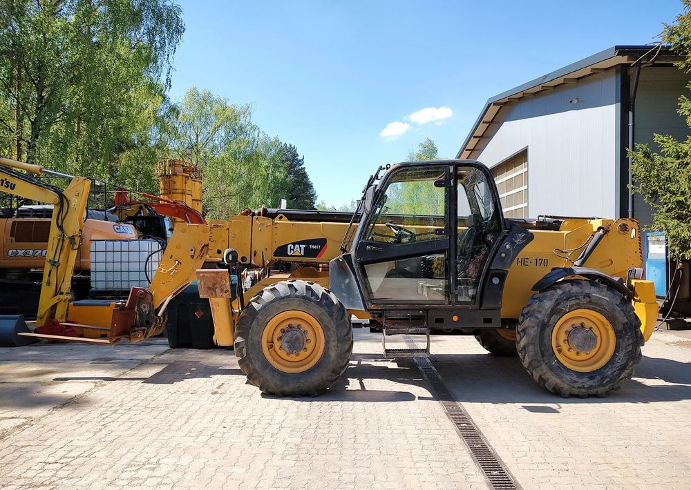 Caterpillar TH417 - Ekskavator teleskopik: foto 1 Caterpillar TH417 - Ekskavator teleskopik: foto 1