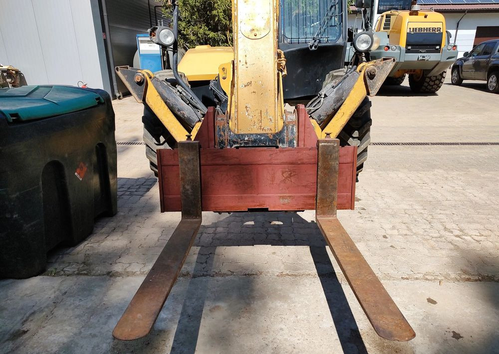 Caterpillar TH417 - Ekskavator teleskopik: foto 3 Caterpillar TH417 - Ekskavator teleskopik: foto 3