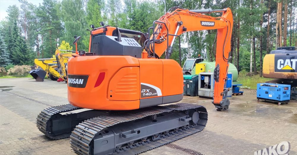 Doosan DX140LCR-5 - Ekskavator me zinxhirë: foto 4 Doosan DX140LCR-5 - Ekskavator me zinxhirë: foto 4
