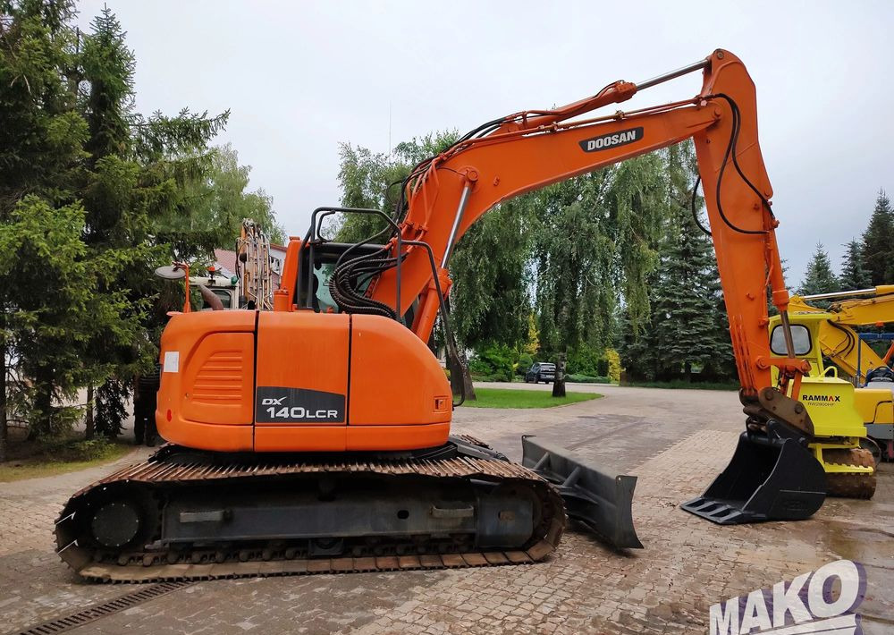 Doosan DX140LCR - Ekskavator me zinxhirë: foto 5 Doosan DX140LCR - Ekskavator me zinxhirë: foto 5