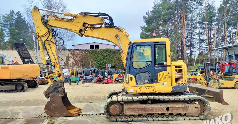 Komatsu PC138 US-8 - Ekskavator me zinxhirë: foto 1 Komatsu PC138 US-8 - Ekskavator me zinxhirë: foto 1