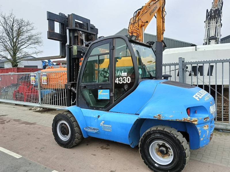 Manitou MI 70 H freelift ruw terrein 7 T heftruck forklift - Pirun më naftë: foto 4 Manitou MI 70 H freelift ruw terrein 7 T heftruck forklift - Pirun më naftë: foto 4