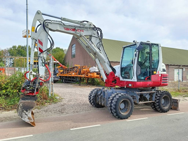 Takeuchi TB 295 W mobiele graafmachine mobile excavator - Ekskavator me goma: foto 1 Takeuchi TB 295 W mobiele graafmachine mobile excavator - Ekskavator me goma: foto 1