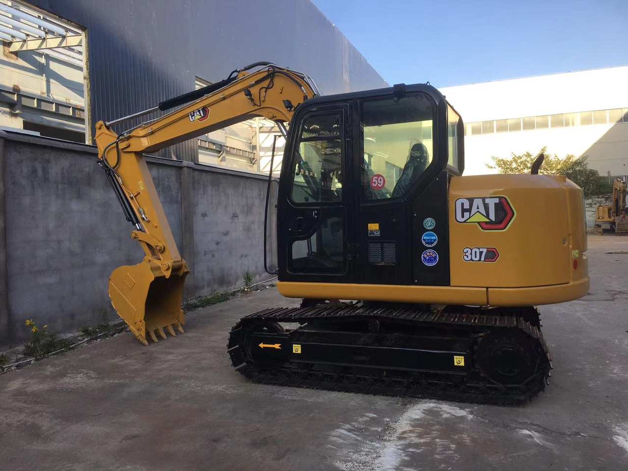 Caterpillar Small Digger CAT 307E2, 306E2 - Ekskavator me zinxhirë: foto 2 Caterpillar Small Digger CAT 307E2, 306E2 - Ekskavator me zinxhirë: foto 2