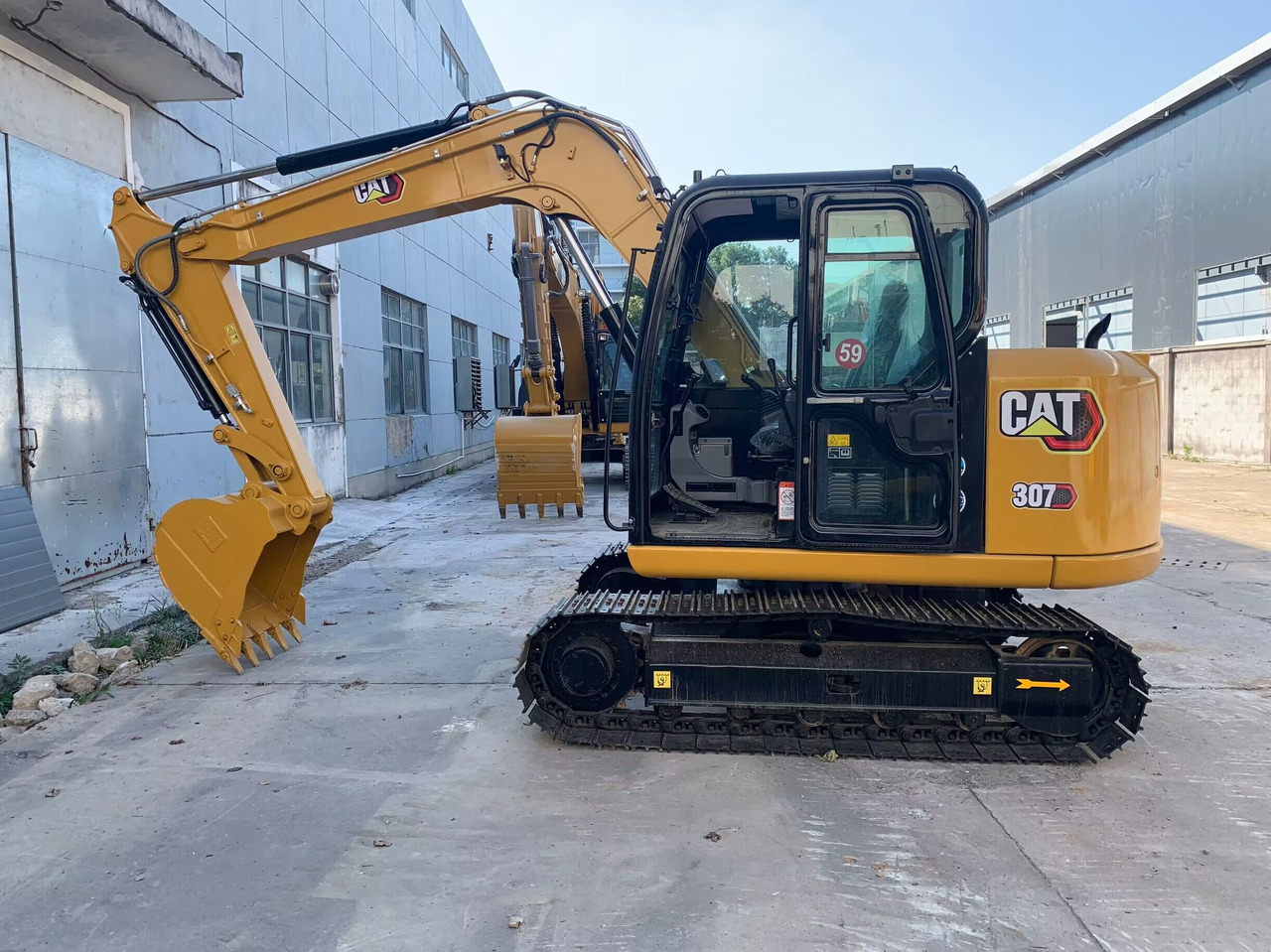 Caterpillar Small Digger CAT 307E2, 306E2 - Ekskavator me zinxhirë: foto 1 Caterpillar Small Digger CAT 307E2, 306E2 - Ekskavator me zinxhirë: foto 1