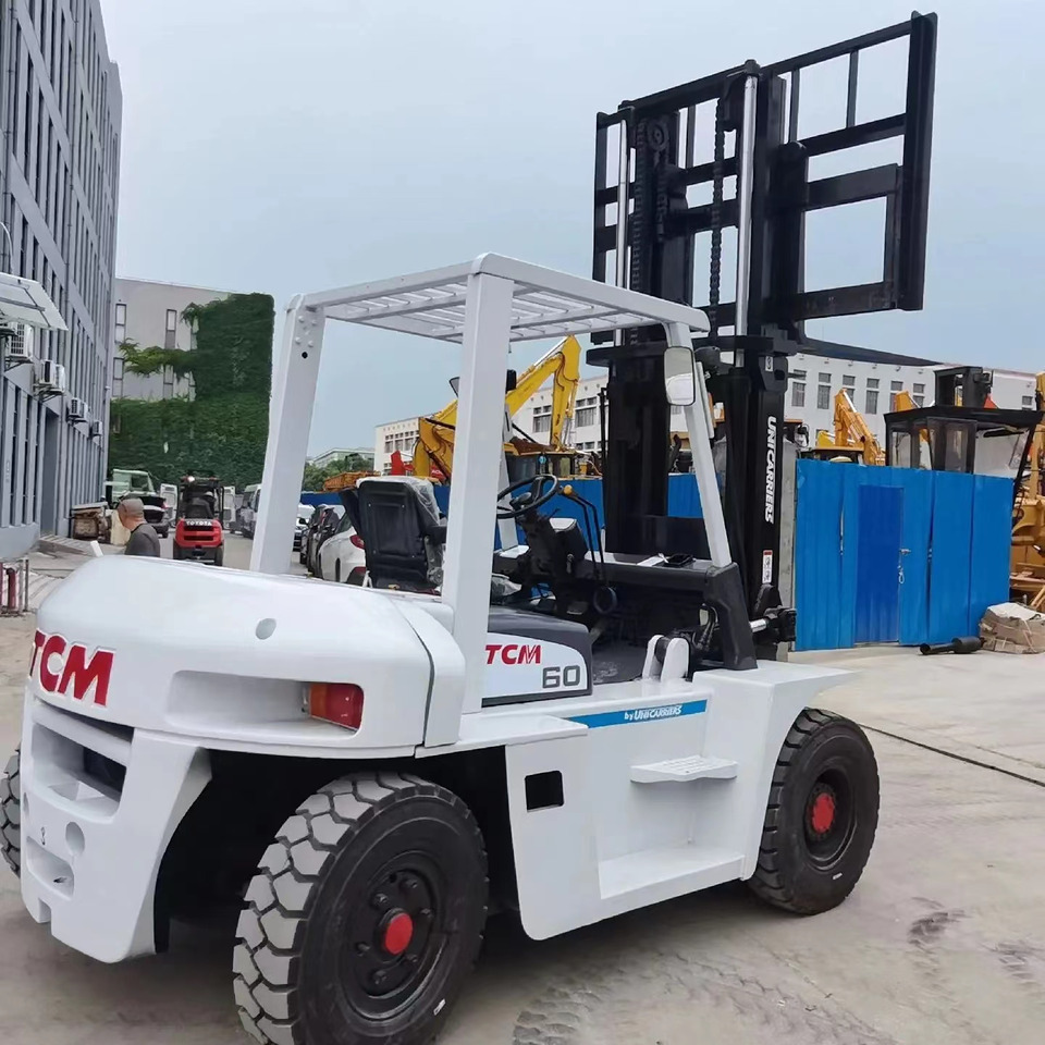 TCM 6 ton Diesel Forklift FD60 with Fork Positioner - Pirun më naftë: foto 4 TCM 6 ton Diesel Forklift FD60 with Fork Positioner - Pirun më naftë: foto 4