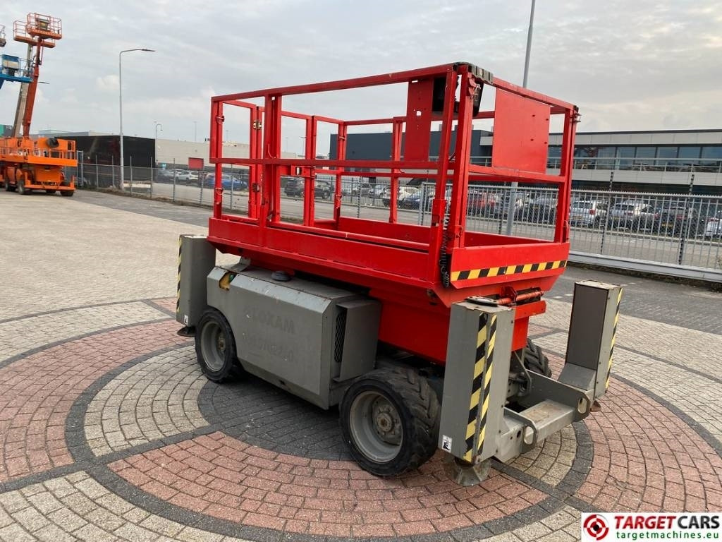 Genie GS-2668RT Diesel 4x4 Scissor Work Lift 992cm - Ngritës gërshërë: foto 2 Genie GS-2668RT Diesel 4x4 Scissor Work Lift 992cm - Ngritës gërshërë: foto 2