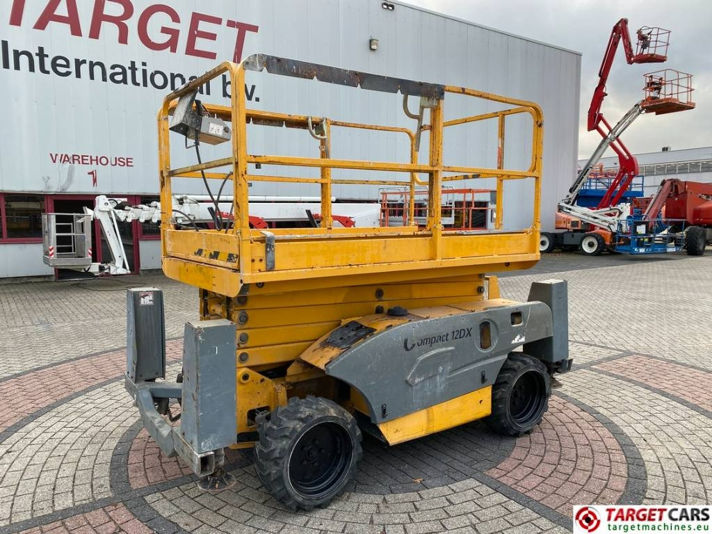 Haulotte Compact 12DX Diesel 4x4 Scissor Work Lift 1206cm - Ngritës gërshërë: foto 1 Haulotte Compact 12DX Diesel 4x4 Scissor Work Lift 1206cm - Ngritës gërshërë: foto 1