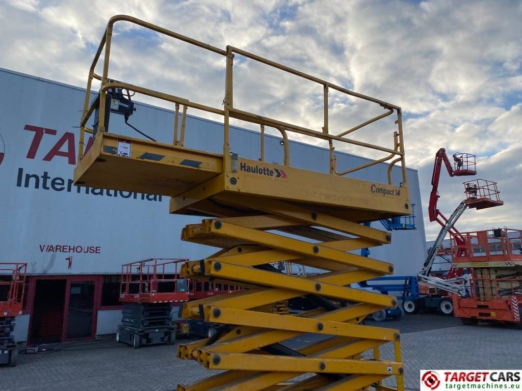 Ngritës gërshërë Haulotte Compact 14 Electric Scissor Work Lift 1385cm: foto 27 Ngritës gërshërë Haulotte Compact 14 Electric Scissor Work Lift 1385cm: foto 27
