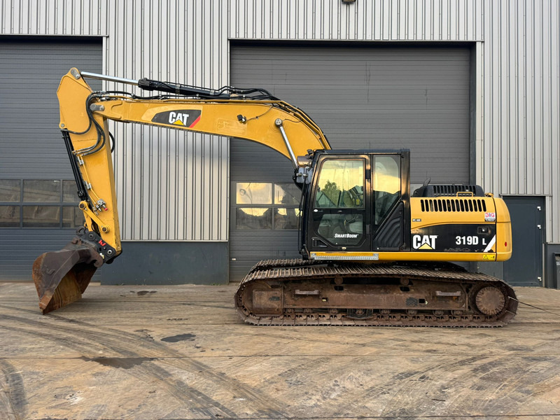 Caterpillar 319DL - Ekskavator me zinxhirë: foto 1 Caterpillar 319DL - Ekskavator me zinxhirë: foto 1