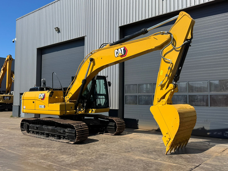 Caterpillar 323D3 - Ekskavator me zinxhirë: foto 5 Caterpillar 323D3 - Ekskavator me zinxhirë: foto 5