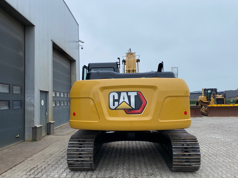 Caterpillar 323D3 - Ekskavator me zinxhirë: foto 4 Caterpillar 323D3 - Ekskavator me zinxhirë: foto 4