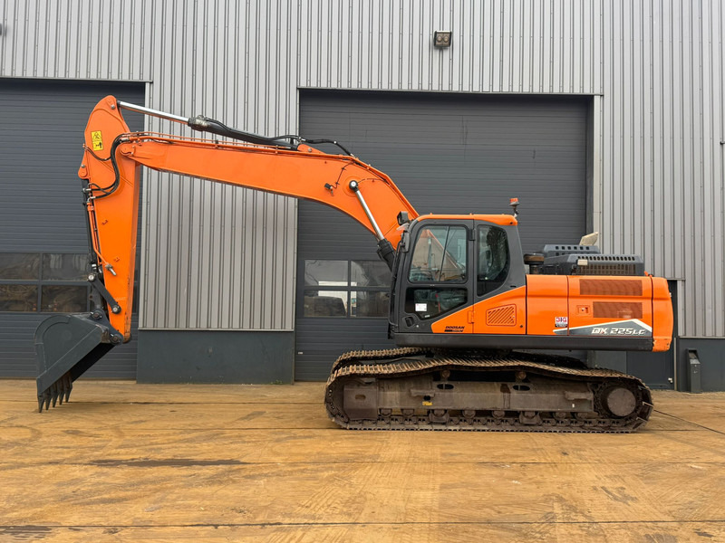 Doosan DX225LC-7 - Ekskavator me zinxhirë: foto 1 Doosan DX225LC-7 - Ekskavator me zinxhirë: foto 1