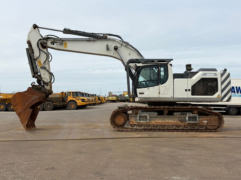 Liebherr R945 LCV (R944 / R946 / R950) - Ekskavator me zinxhirë: foto 1 Liebherr R945 LCV (R944 / R946 / R950) - Ekskavator me zinxhirë: foto 1
