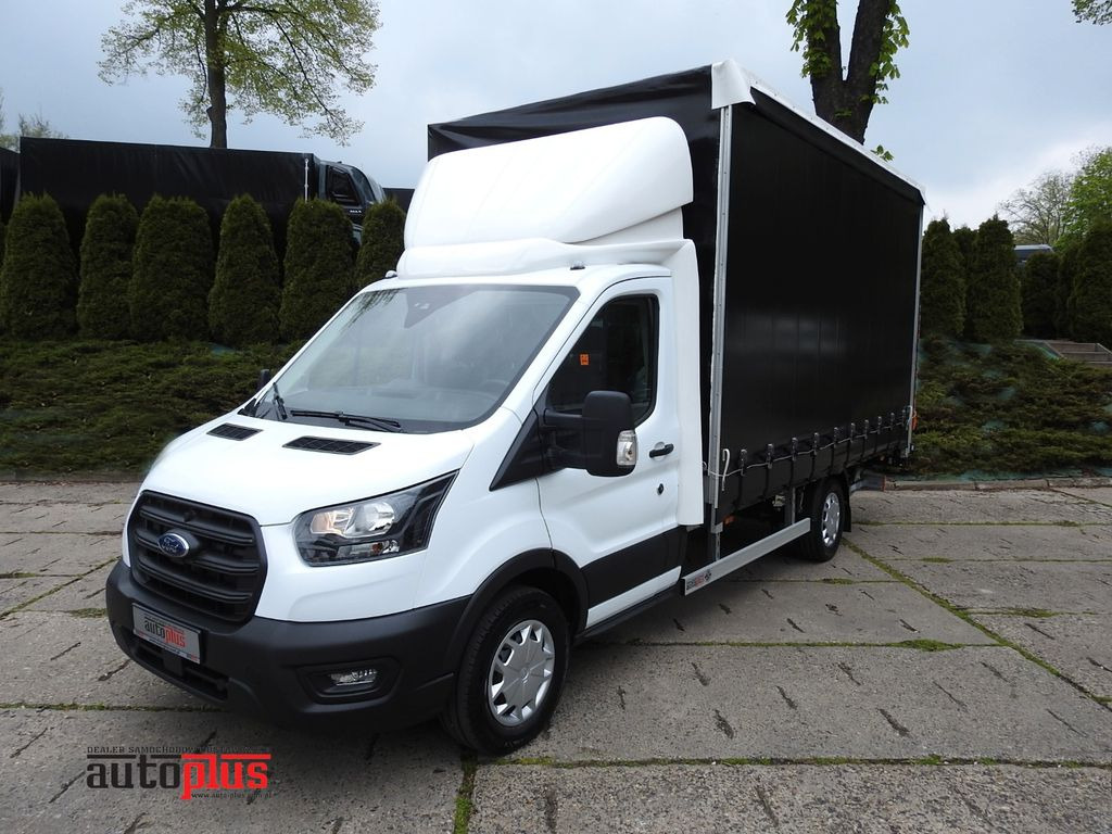 Ford TRANSIT PRITSCHE PLANE 8 PALLETS AUFZUG A/C - Kamioncine me tendë: foto 1 Ford TRANSIT PRITSCHE PLANE 8 PALLETS AUFZUG A/C - Kamioncine me tendë: foto 1