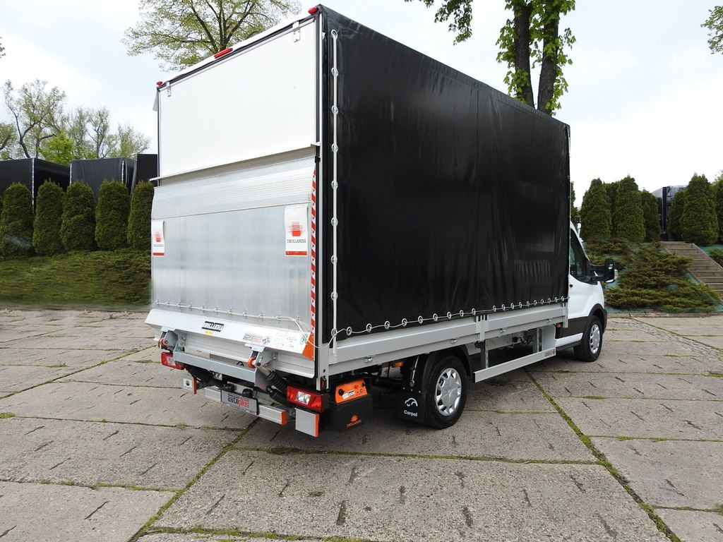 Ford TRANSIT PRITSCHE PLANE 8 PALLETS AUFZUG A/C - Kamioncine me tendë: foto 3 Ford TRANSIT PRITSCHE PLANE 8 PALLETS AUFZUG A/C - Kamioncine me tendë: foto 3