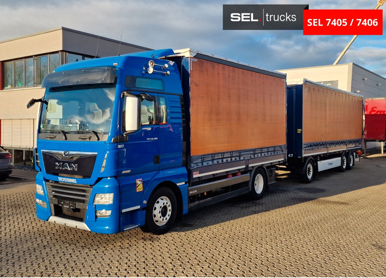 MAN TGX 18.580 4X2 LL/ Intarder/Aluklappen/Durchlade - Kamion me tendë: foto 2 MAN TGX 18.580 4X2 LL/ Intarder/Aluklappen/Durchlade - Kamion me tendë: foto 2