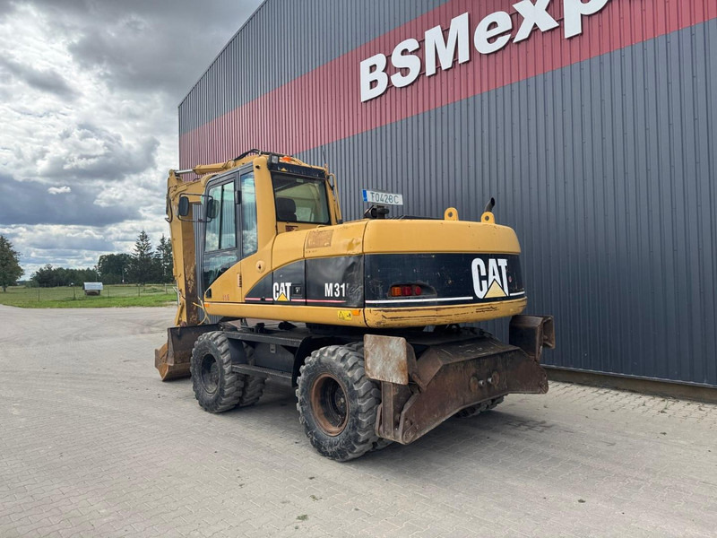 Caterpillar M 315 C - Ekskavator me goma: foto 4 Caterpillar M 315 C - Ekskavator me goma: foto 4