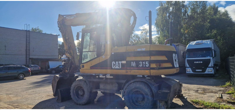 Caterpillar M 315 Rototilt - Ekskavator me goma: foto 3 Caterpillar M 315 Rototilt - Ekskavator me goma: foto 3