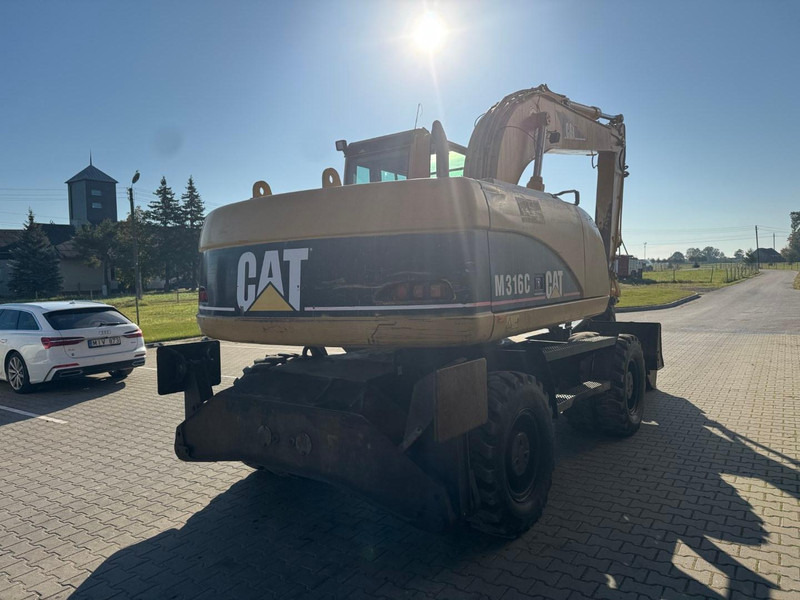 Caterpillar M 316 C - Ekskavator me goma: foto 3 Caterpillar M 316 C - Ekskavator me goma: foto 3