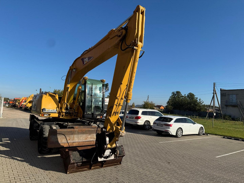 Caterpillar M 316 C - Ekskavator me goma: foto 2 Caterpillar M 316 C - Ekskavator me goma: foto 2