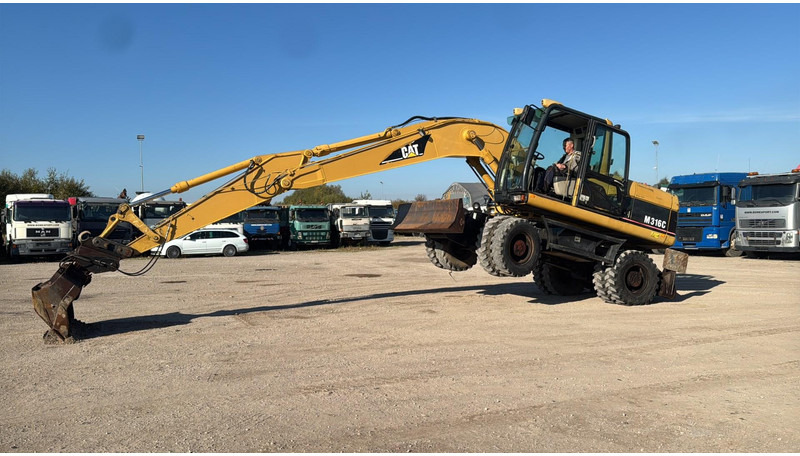 Caterpillar M 316 C - Ekskavator me goma: foto 5 Caterpillar M 316 C - Ekskavator me goma: foto 5