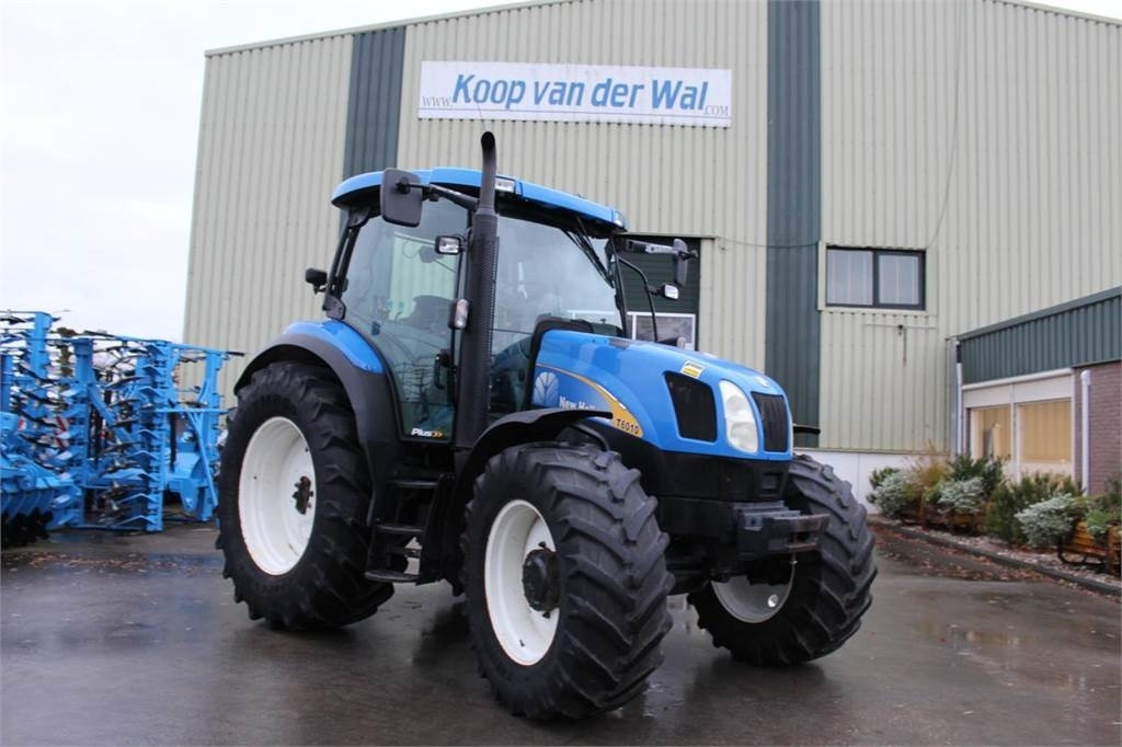 New Holland T6010 Plus - Traktor: foto 1 New Holland T6010 Plus - Traktor: foto 1
