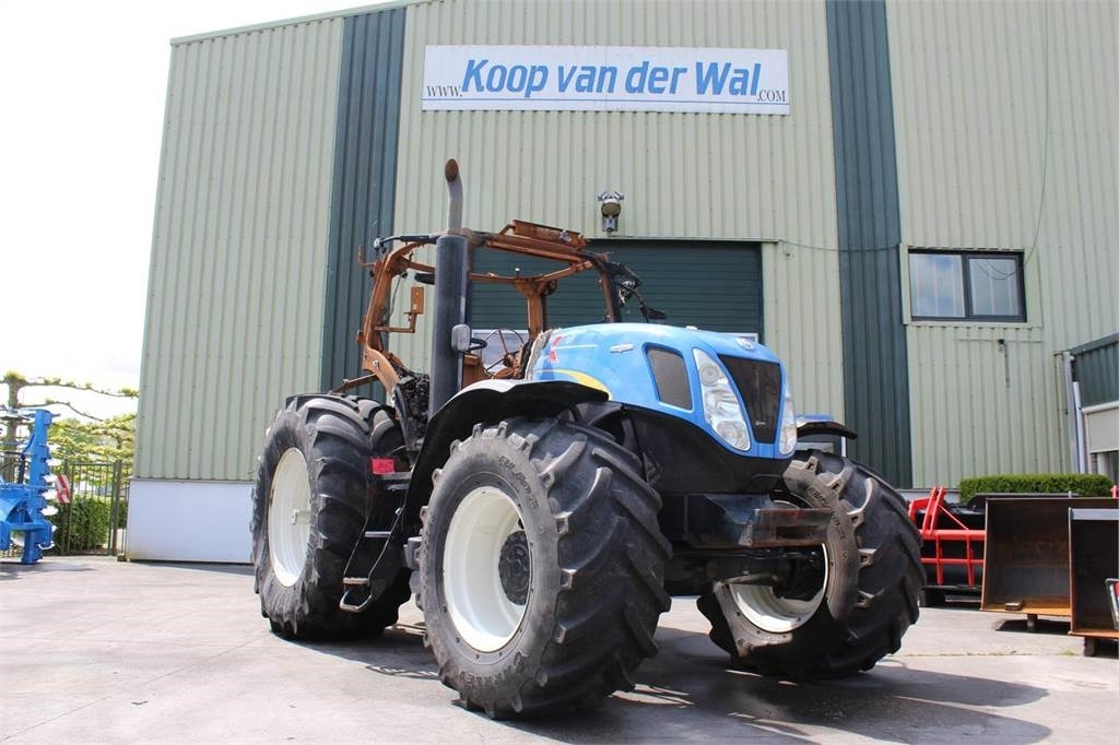 New Holland T7030 - Traktor: foto 1 New Holland T7030 - Traktor: foto 1