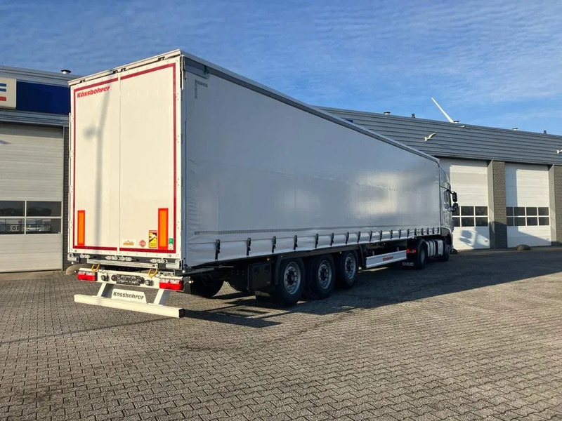 Kässbohrer SCS X / 90 - 12 / 27 Schuifzeilen met twee liftassen en hefdak 500mm - Gjysmë rimorkio me tendë: foto 5 Kässbohrer SCS X / 90 - 12 / 27 Schuifzeilen met twee liftassen en hefdak 500mm - Gjysmë rimorkio me tendë: foto 5