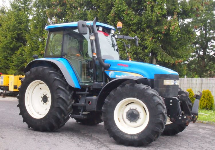 Ciągnik New Holland TM 140 2004 Przedni TUZ - Traktor: foto 1 Ciągnik New Holland TM 140 2004 Przedni TUZ - Traktor: foto 1