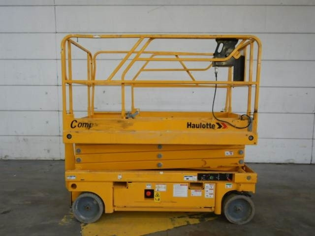 Haulotte Compact 10 - Ngritës gërshërë: foto 1 Haulotte Compact 10 - Ngritës gërshërë: foto 1