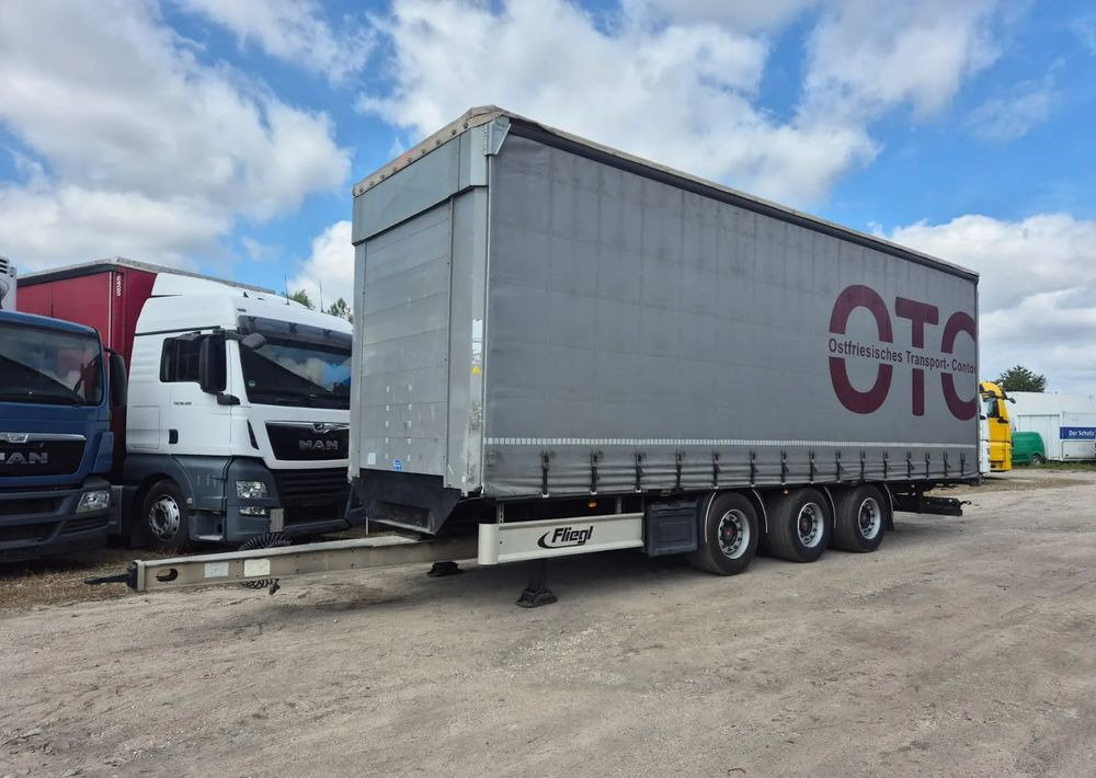 Fliegl Tandem 3 osie - Rimorkio me tendë: foto 1 Fliegl Tandem 3 osie - Rimorkio me tendë: foto 1