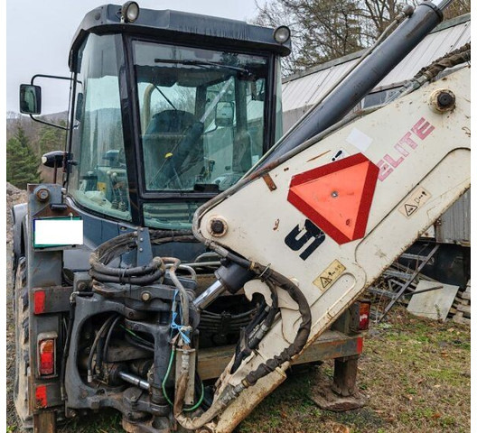 Terex Elite 970 - Fadromë me shkarkim nga prapa: foto 3 Terex Elite 970 - Fadromë me shkarkim nga prapa: foto 3