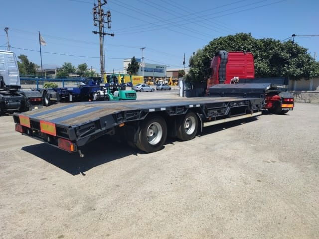 Fliegl D6 - Gjysmë rimorkio me plan ngarkimi të ulët: foto 1 Fliegl D6 - Gjysmë rimorkio me plan ngarkimi të ulët: foto 1
