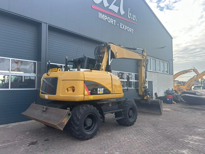 Caterpillar M313D - Ekskavator me goma: foto 4 Caterpillar M313D - Ekskavator me goma: foto 4