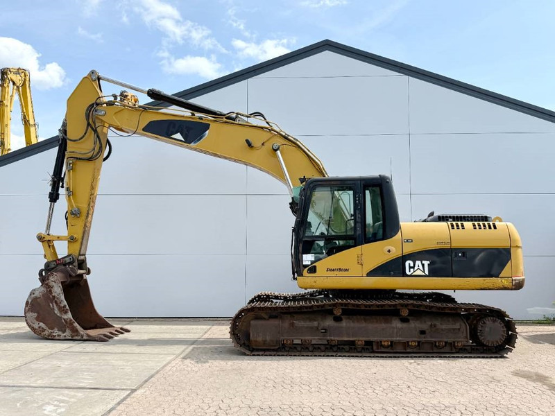 Cat 323DL - German Machine / Quick Coupler - Ekskavator me zinxhirë: foto 1 Cat 323DL - German Machine / Quick Coupler - Ekskavator me zinxhirë: foto 1