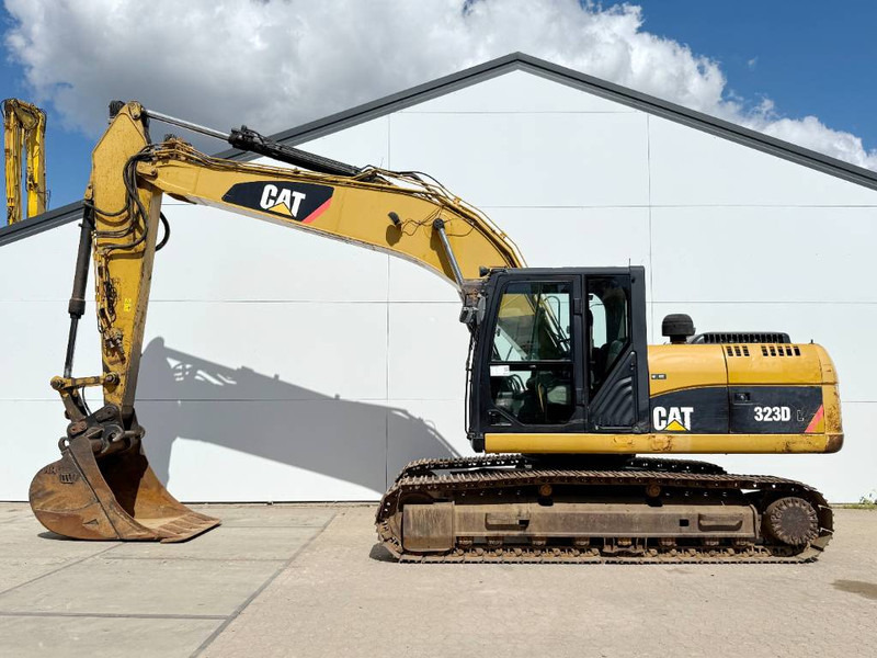 Cat 323DL - German Machine / Quick Coupler - Ekskavator me zinxhirë: foto 1 Cat 323DL - German Machine / Quick Coupler - Ekskavator me zinxhirë: foto 1