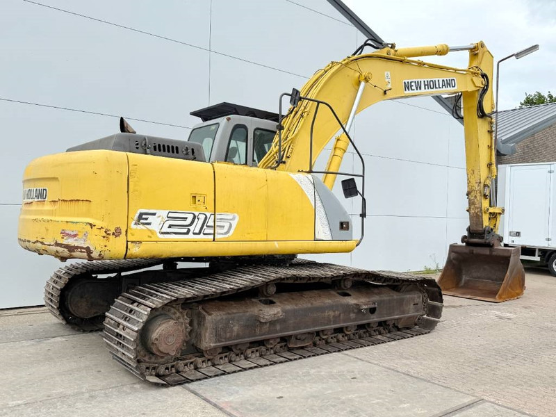 New Holland E215LC - German Machine / Hammer Lines - Ekskavator me zinxhirë: foto 5 New Holland E215LC - German Machine / Hammer Lines - Ekskavator me zinxhirë: foto 5