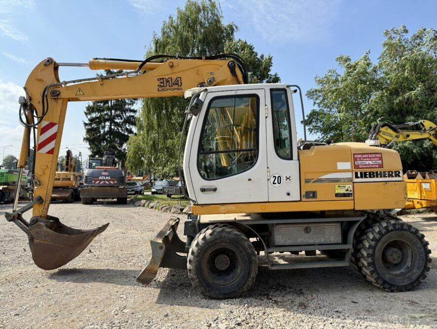 Liebherr A314 - Ekskavator me goma: foto 1 Liebherr A314 - Ekskavator me goma: foto 1