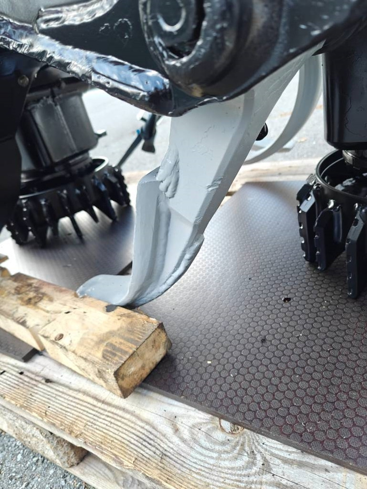 Kokë e makinës prerëse të pyllit Komatsu C 93: foto 11 Kokë e makinës prerëse të pyllit Komatsu C 93: foto 11